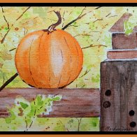 Pumpkin on a Fence.jpg