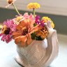 Zinnias in Snail vase