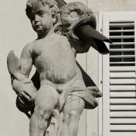 Boy Holding A Fish And A Gutter (Piran, Slovenia).jpg