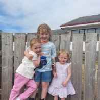 theo and sisters.jpg