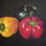 Peppers on black