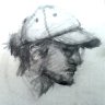 manbun man with cap